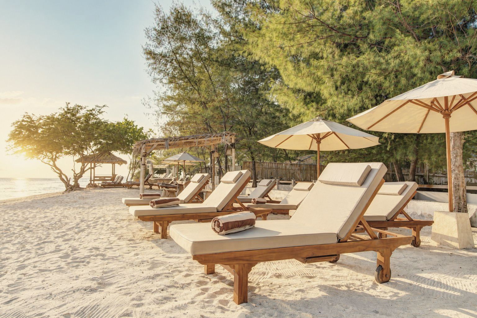 Sun loungers on the private beach, north shore of Gili Trawangan